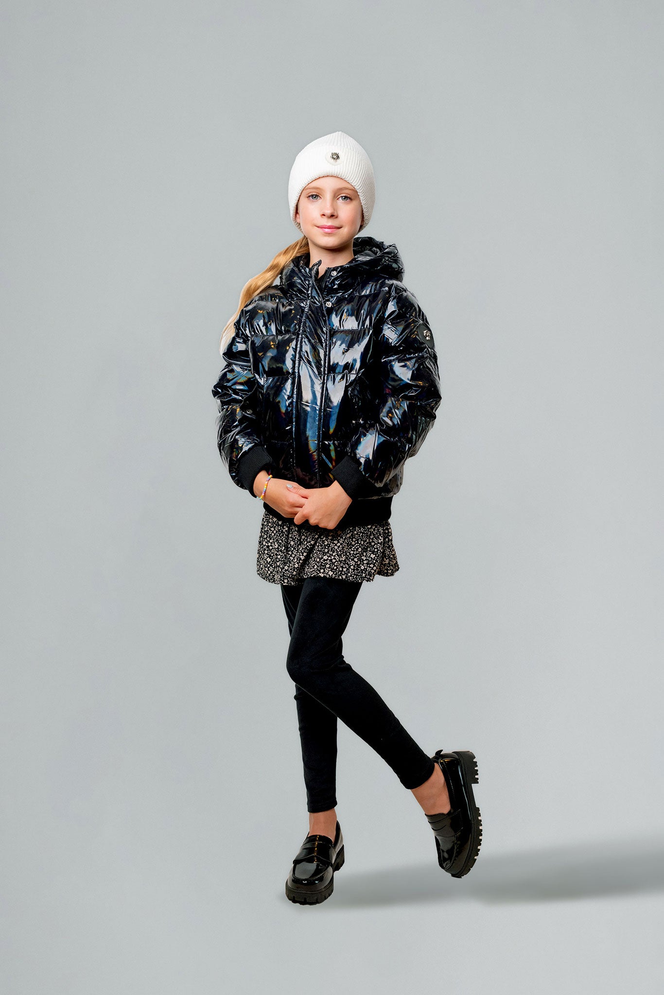 Woodpecker Kids' Chickadee Winter coat. High-end Canadian designer winter coat for Kids in "Oily Black" colour. Woodpecker cruelty-free winter coat designed in Canada. Kids' heavy weight short length premium designer jacket for winter. Superior quality warm winter coat for kids. Moose Knuckles, Canada Goose, Mackage, Montcler, Will Poho, Willbird, Nic Bayley. Extra Warm. Shiny parka. Stylish winter jacket. Designer winter coat.