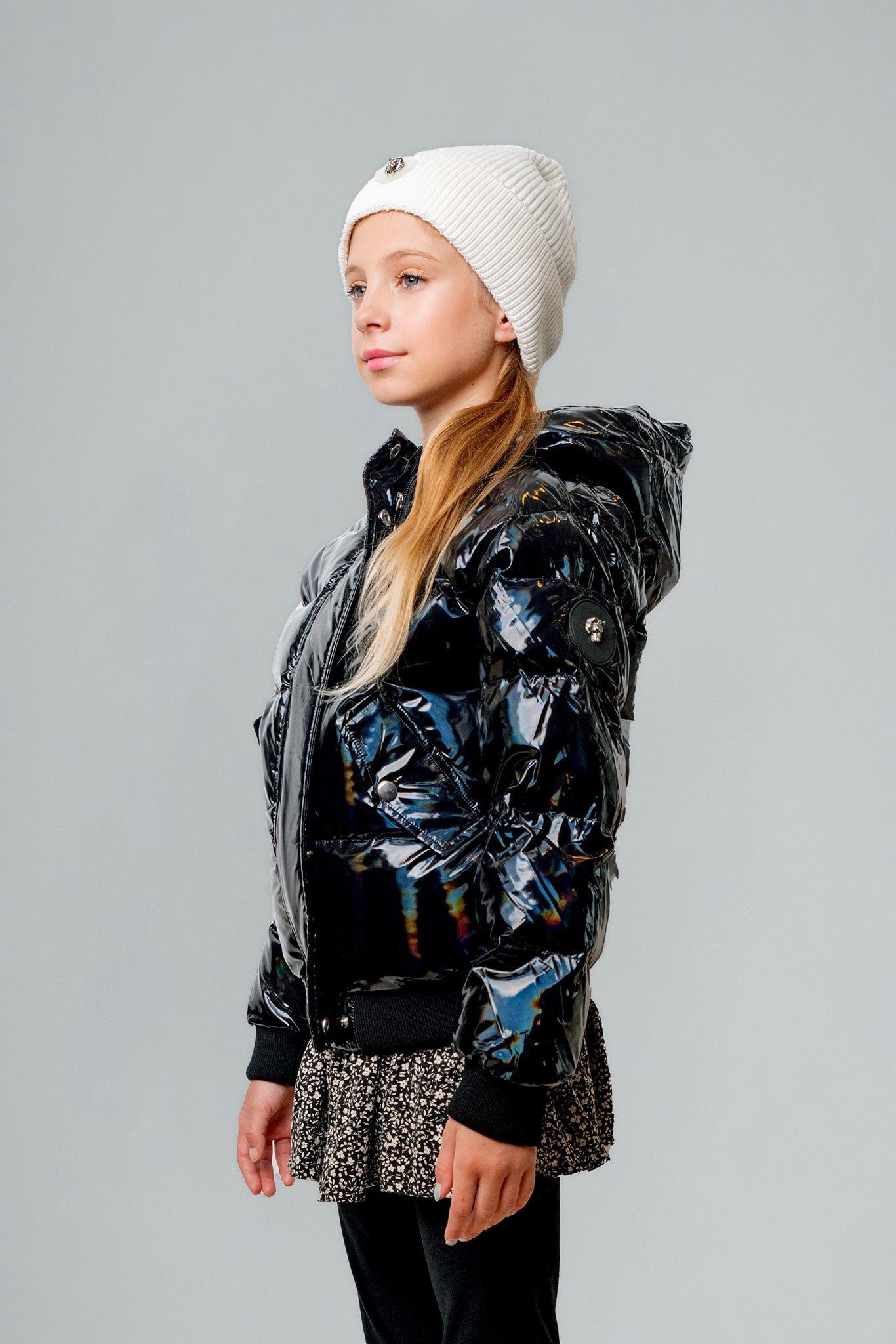 Woodpecker Kids' Chickadee Winter coat. High-end Canadian designer winter coat for Kids in "Oily Black" colour. Woodpecker cruelty-free winter coat designed in Canada. Kids' heavy weight short length premium designer jacket for winter. Superior quality warm winter coat for kids. Moose Knuckles, Canada Goose, Mackage, Montcler, Will Poho, Willbird, Nic Bayley. Extra Warm. Shiny parka. Stylish winter jacket. Designer winter coat.