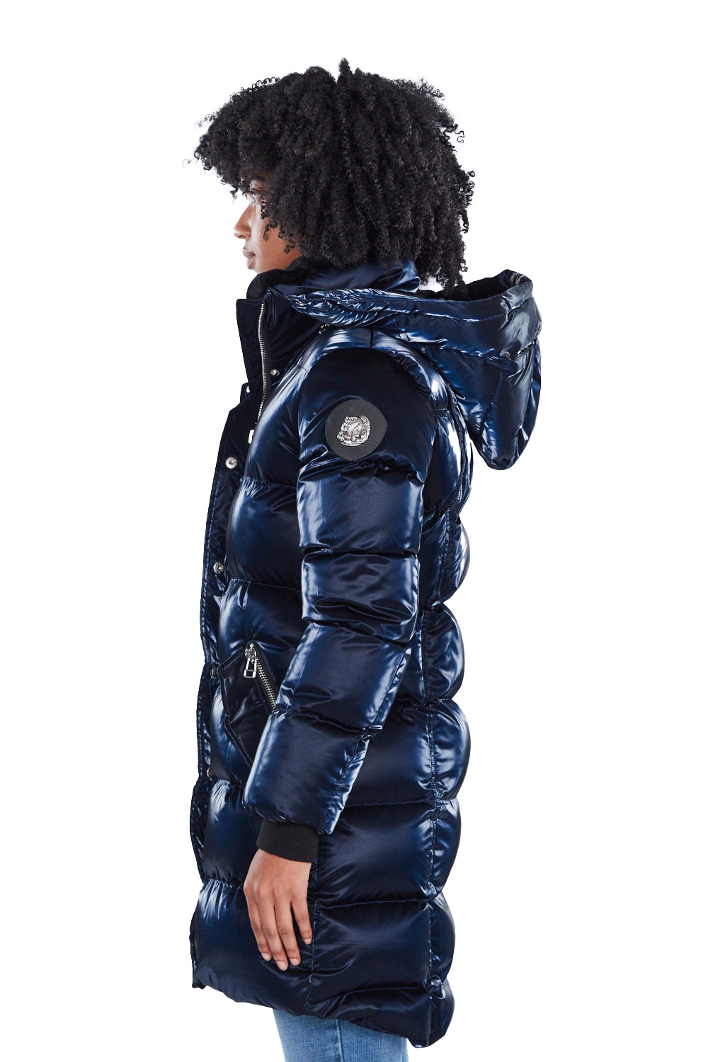 Woodpecker Women's Penguin Long Winter coat. High-end Canadian designer winter coat for women in shiny "All Wet Navy" blue colour. Woodpecker cruelty-free winter coat designed in Canada. Women's heavy weight long length premium designer jacket for winter. Superior quality warm winter coat for women. Moose Knuckles, Canada Goose, Mackage, Montcler, Will Poho, Willbird, Nic Bayley. Extra warm. Shiny parka. Stylish winter jacket. Designer winter coat.