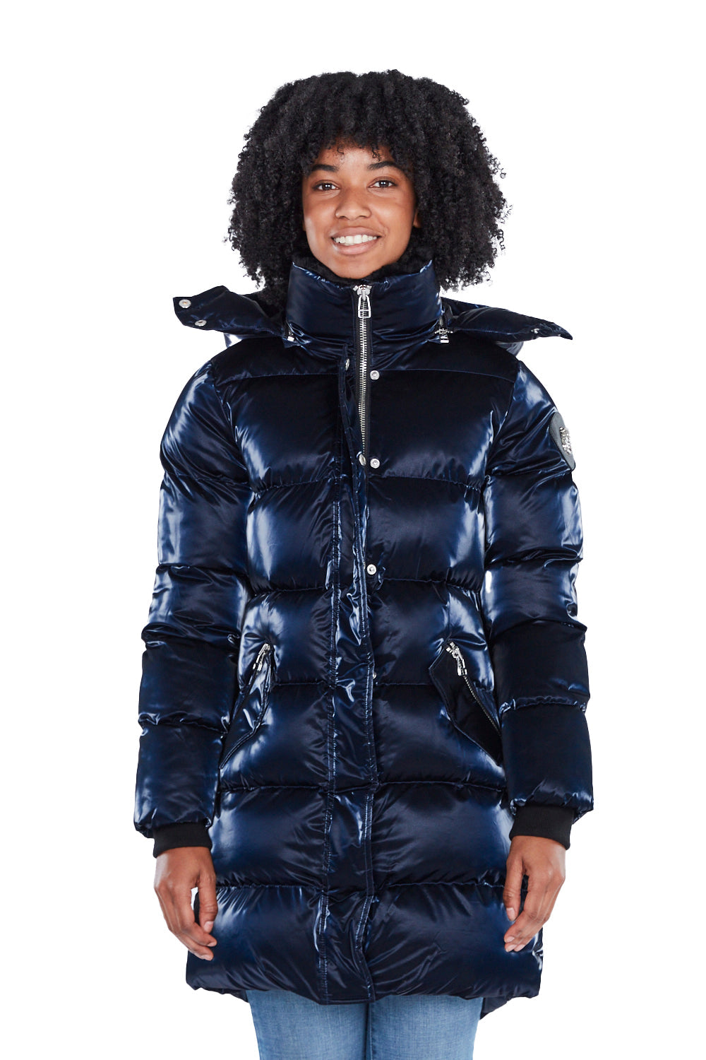 Woodpecker Women's Penguin Long Winter coat. High-end Canadian designer winter coat for women in shiny "All Wet Navy" blue colour. Woodpecker cruelty-free winter coat designed in Canada. Women's heavy weight long length premium designer jacket for winter. Superior quality warm winter coat for women. Moose Knuckles, Canada Goose, Mackage, Montcler, Will Poho, Willbird, Nic Bayley. Extra warm. Shiny parka. Stylish winter jacket. Designer winter coat.