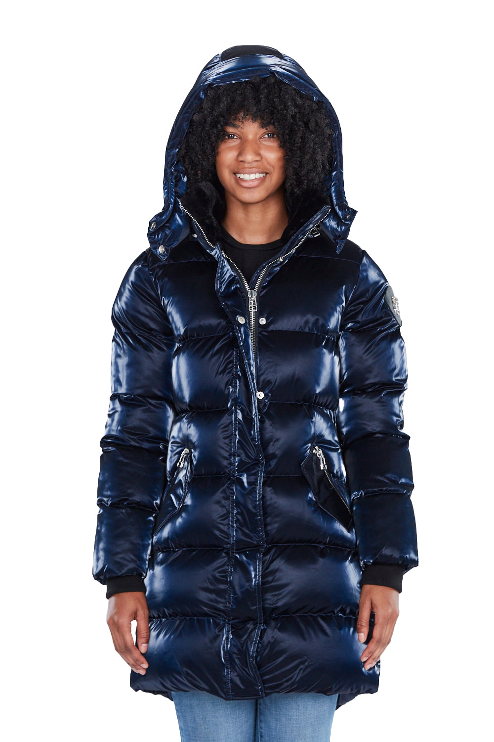 Woodpecker Women's Penguin Long Winter coat. High-end Canadian designer winter coat for women in shiny "All Wet Navy" blue colour. Woodpecker cruelty-free winter coat designed in Canada. Women's heavy weight long length premium designer jacket for winter. Superior quality warm winter coat for women. Moose Knuckles, Canada Goose, Mackage, Montcler, Will Poho, Willbird, Nic Bayley. Extra warm. Shiny parka. Stylish winter jacket. Designer winter coat.